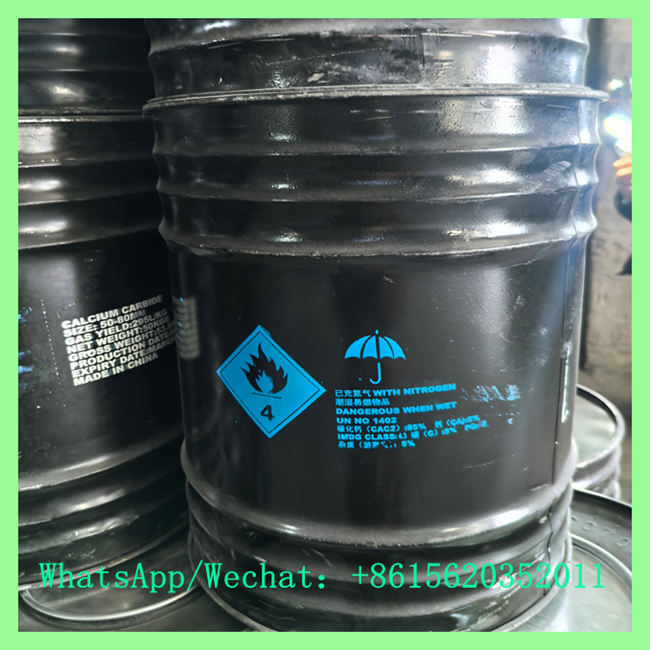 Close-up of UN standard dangerous goods hazard label on China calcium carbide 50-80mm steel drum