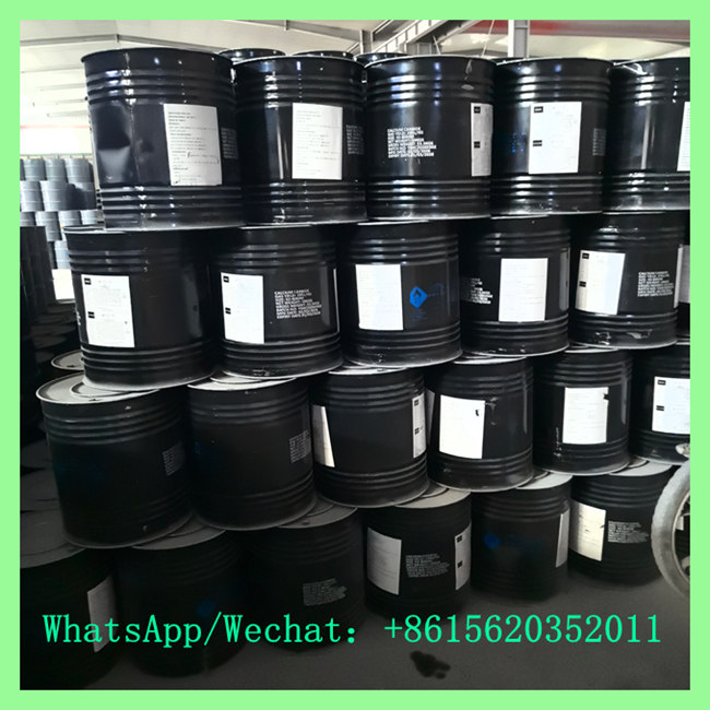 China calcium carbide 50-80mm packed in sealed black steel drums stacked in warehouse