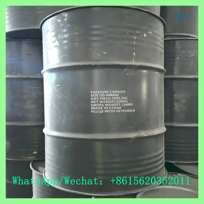 Single 100kg sealed steel drum of calcium carbide with product parameters and nitrogen fill label