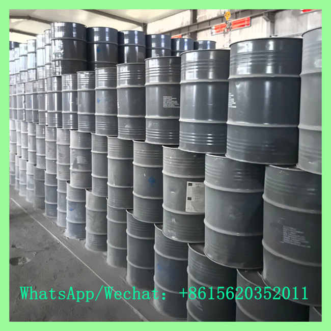 Side angle view of mass-stored 100kg industrial calcium carbide steel drums