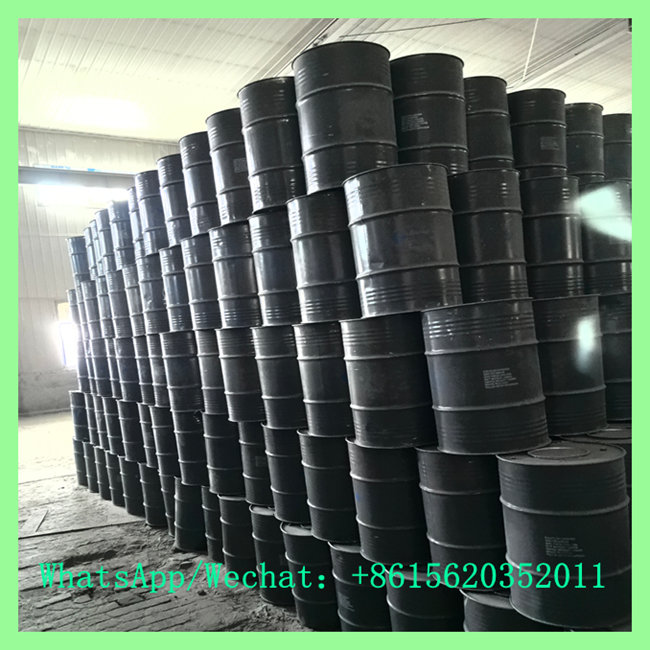 High stack of heavy-duty 100kg calcium carbide drums ready for export shipping