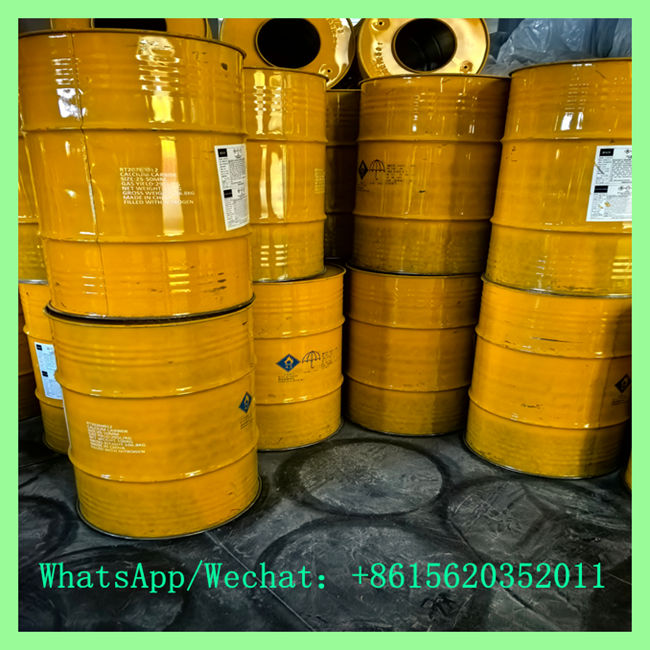 Bright yellow steel drums for purchasing chemical calcium carbide online in warehouse
