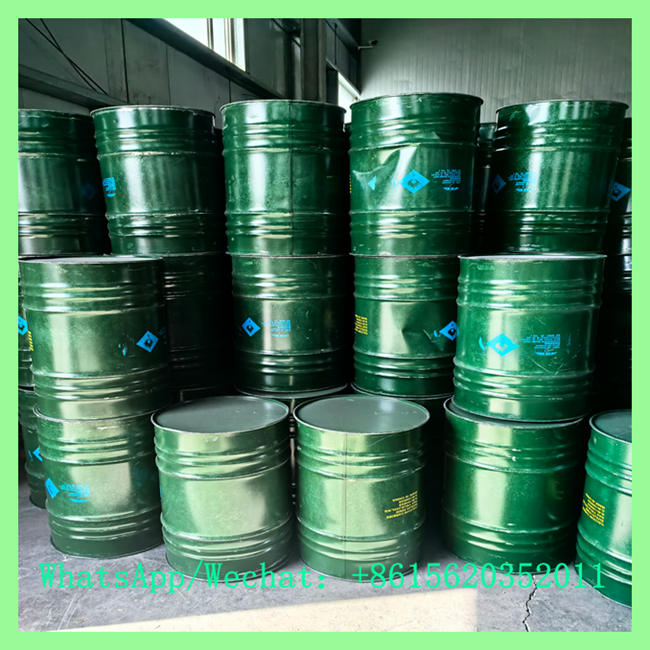 Green steel drums of industrial calcium carbide in warehouse ready for calcium carbide online shopping
