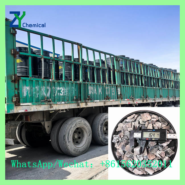 Flatbed truck loaded with steel drums alongside digital caliper measurement showing 15-25mm calcium carbide lump sizing. Contact WhatsApp/Wechat: +8615620352011