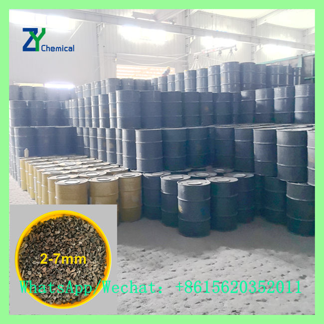 Massive warehouse filled with stacked steel chemical drums featuring an inset of 2-7mm fine calcium carbide for steelmaking. WhatsApp/Wechat: +8615620352011