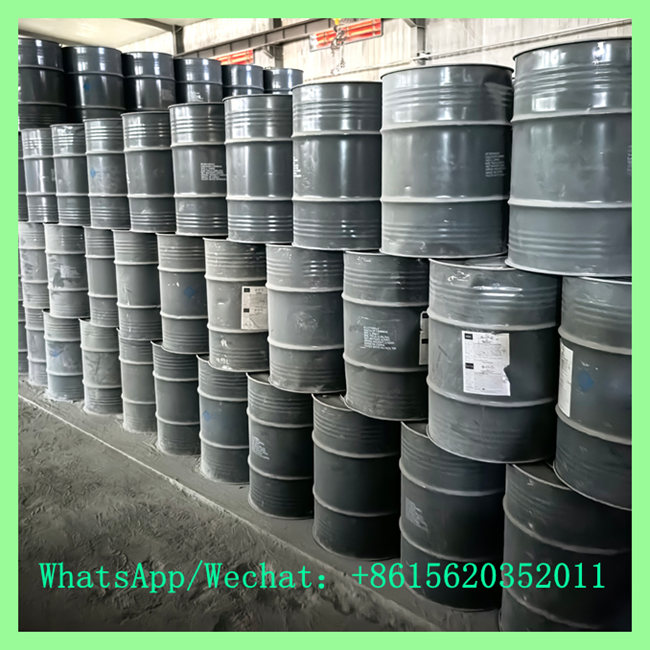 Bulk industrial packaging of calcium carbide crystals stored in stacked metal barrels