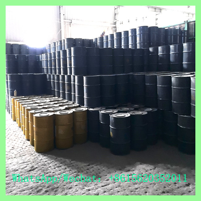 Industrial warehouse filled with stacked steel drums ready for global export at factory-direct china calcium carbide price