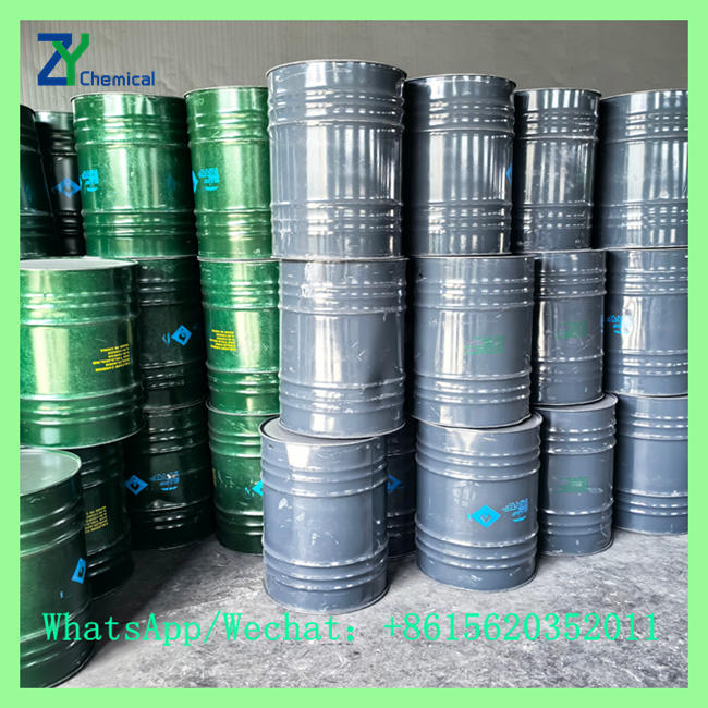 Stacked green and grey steel drums for bulk supply and factory-direct calcium carbide powder price inquiries