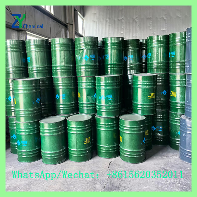 Green metal drums stored in warehouse for wholesale use of calcium carbide reagent