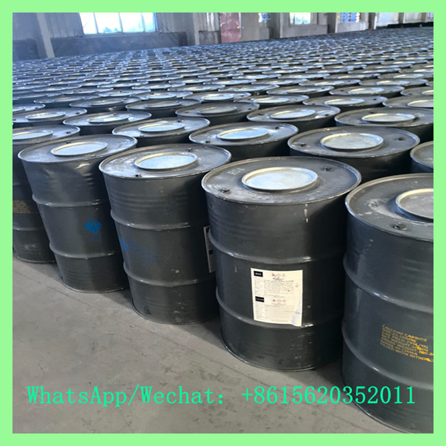 Sealed steel drums of industrial chinese calcium carbide stored in warehouse for export